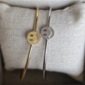 Brazalete de acero rígido fino carita feliz